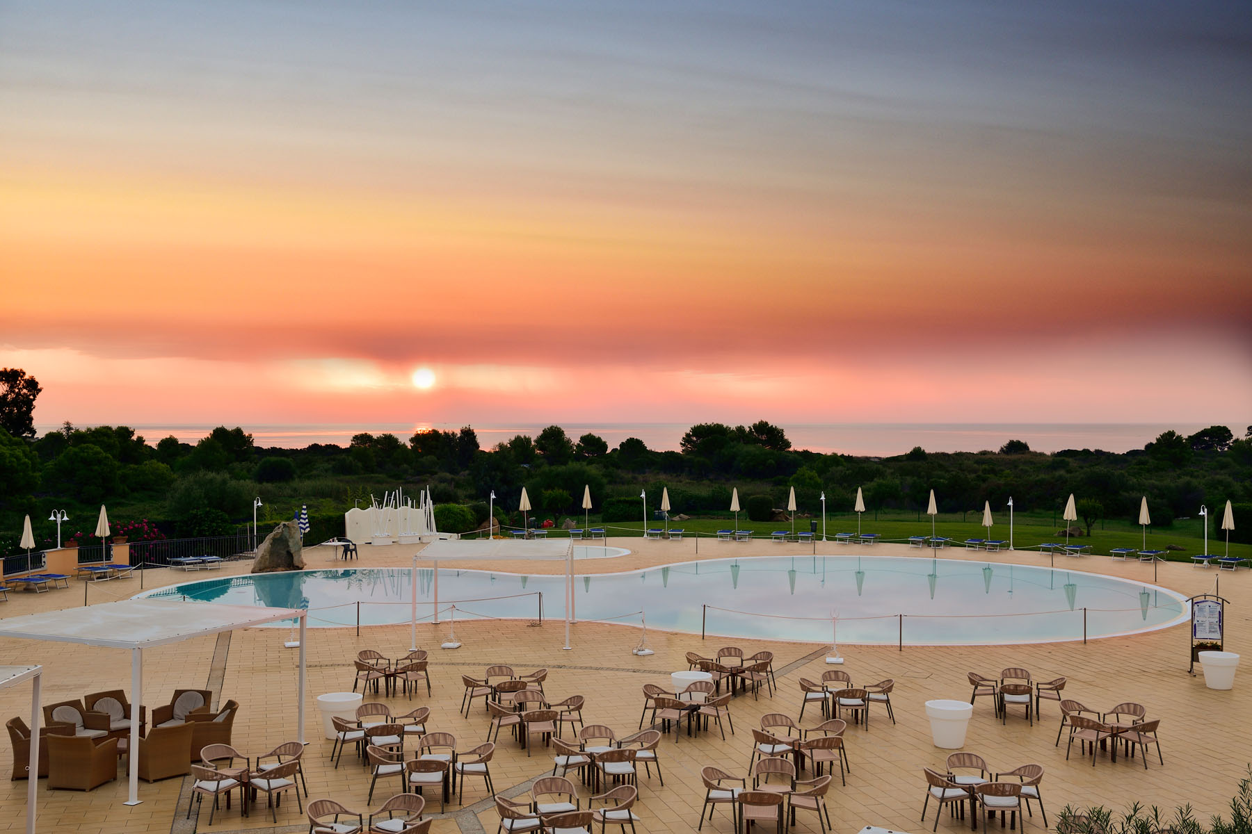 hotel baia del porto ottiolu budoni sardegna piscina tramonto 2
