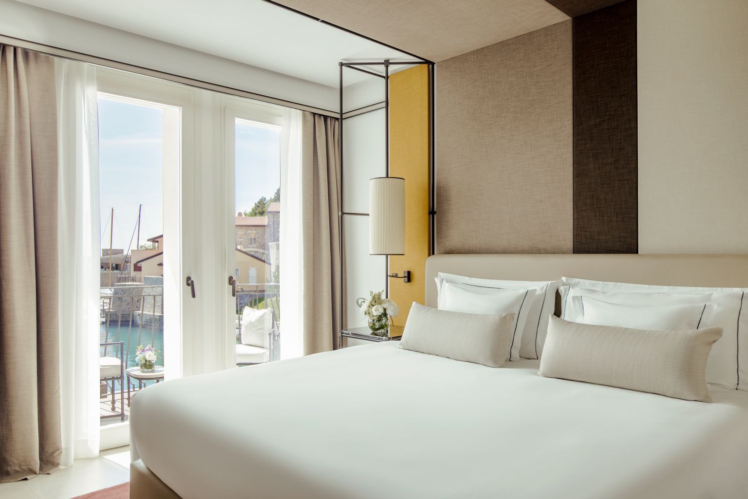 tivoli portopiccolo sistiana resort guest room deluxe room with marina view 1